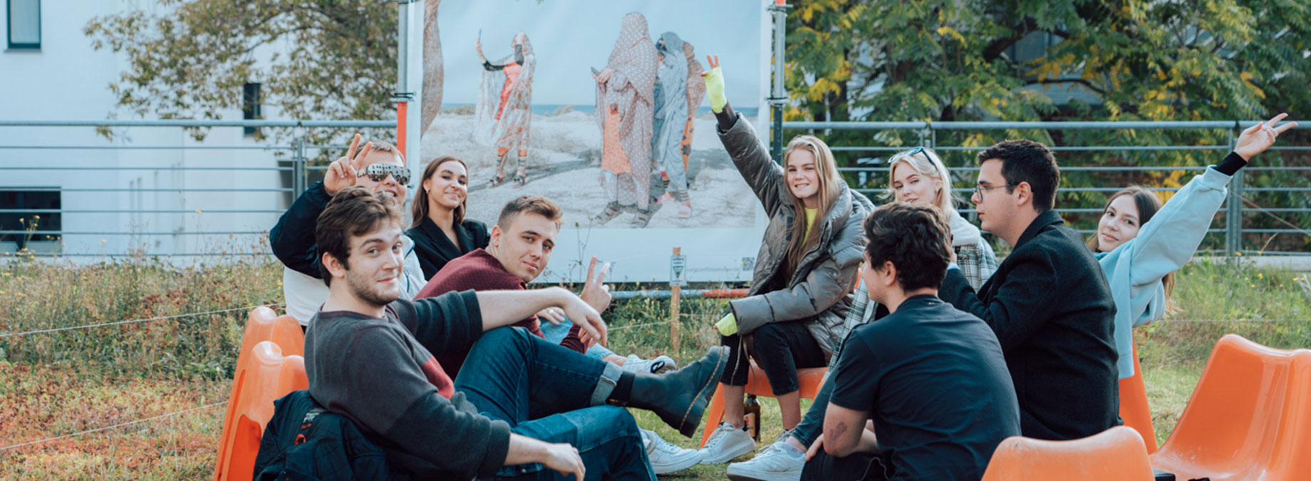 Students enjoying together on terrace