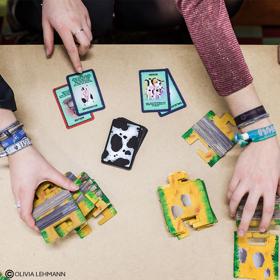 Students with playing cards