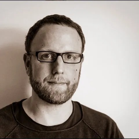 a man wearing glasses
