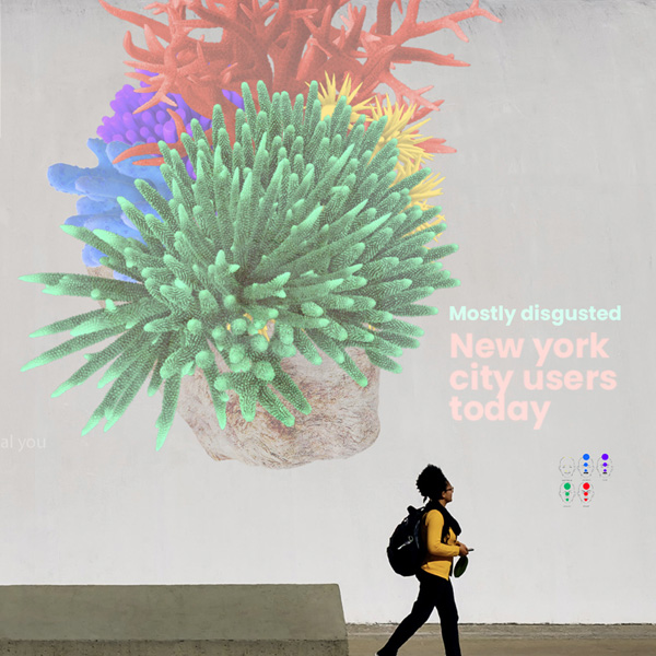 a huge poster with graphic elemets and a woman walking by