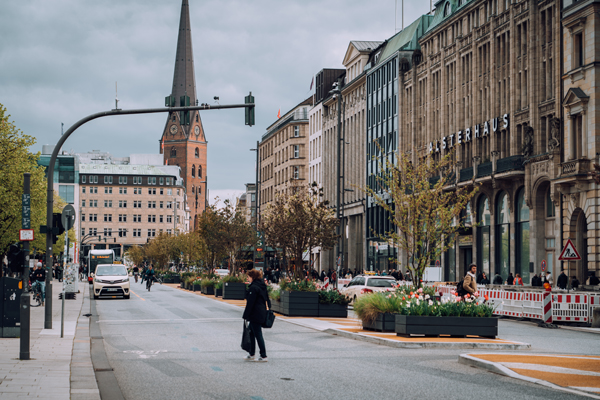 a city with a church and a huge street