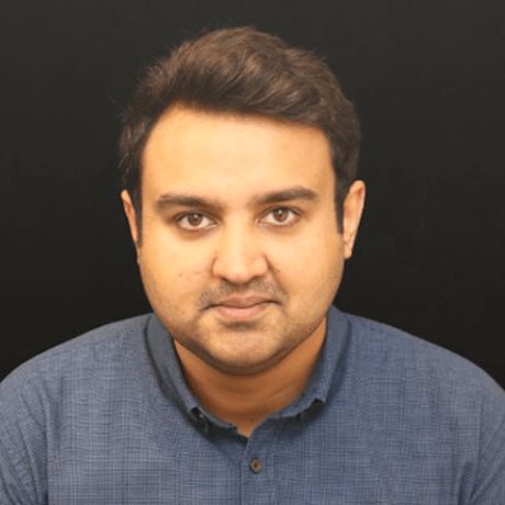 a man in a blue shirt