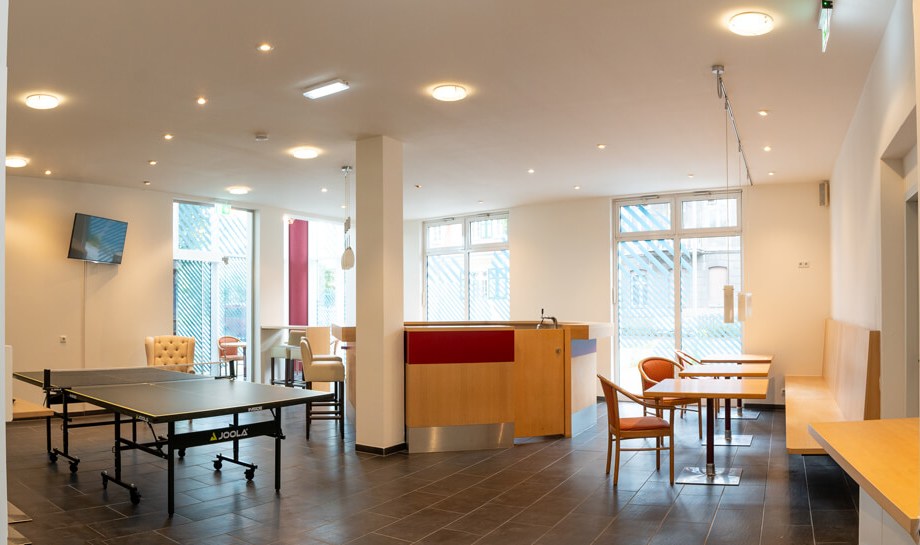 a room with tables and chairs