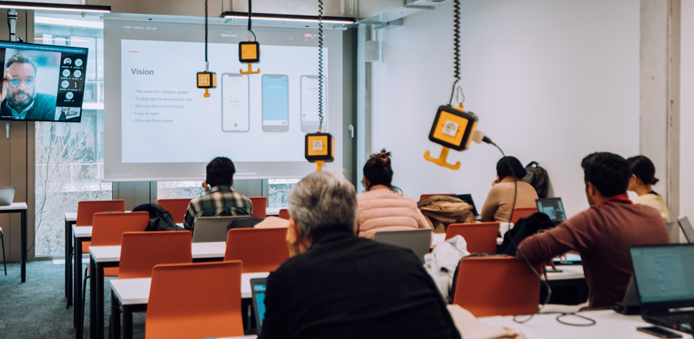 a group of people in a meeting