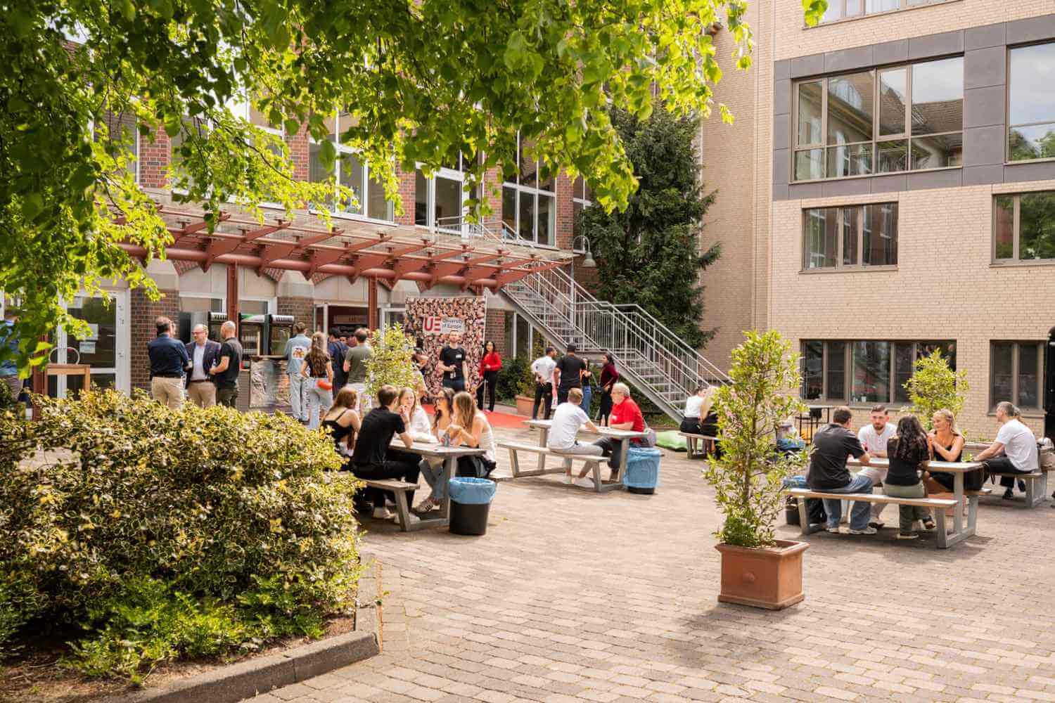 a group of people sitting outside