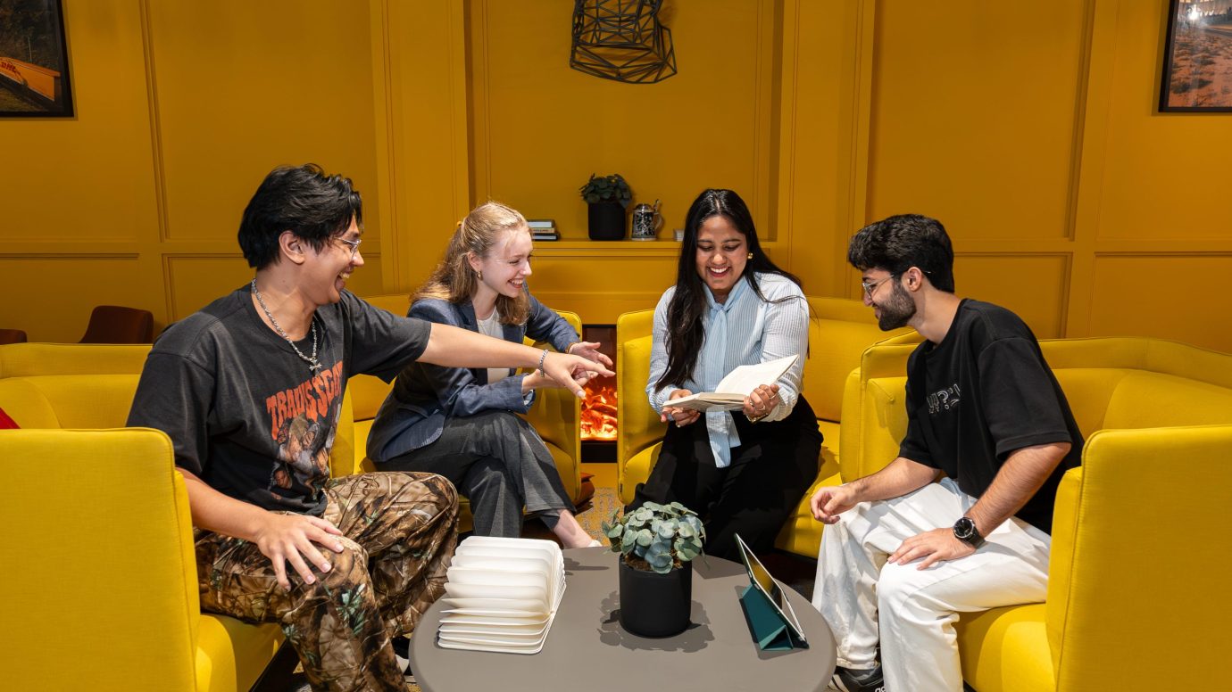 a group of people sitting on a couch