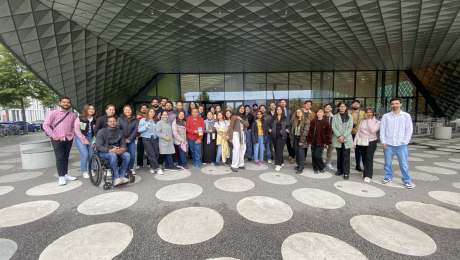 a group of people posing for a photo