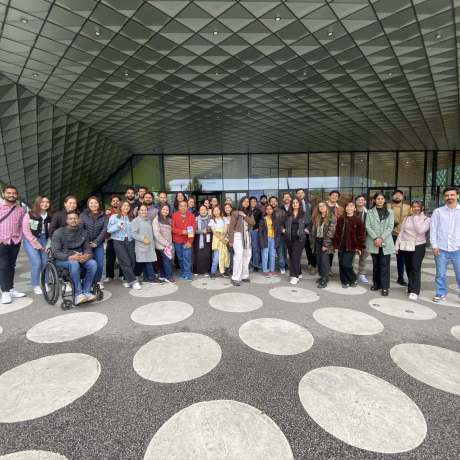 a group of people posing for a photo