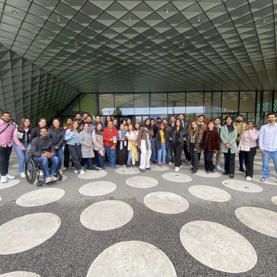 a group of people posing for a photo