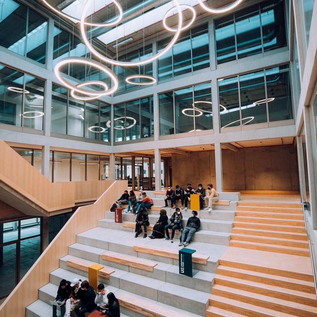 A group of students sitting on a staircase