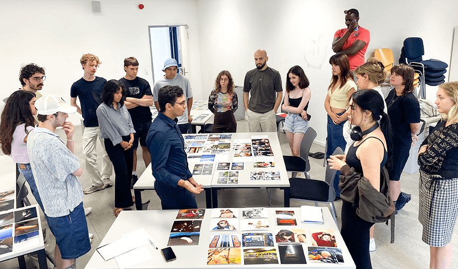 a group of people standing in a room