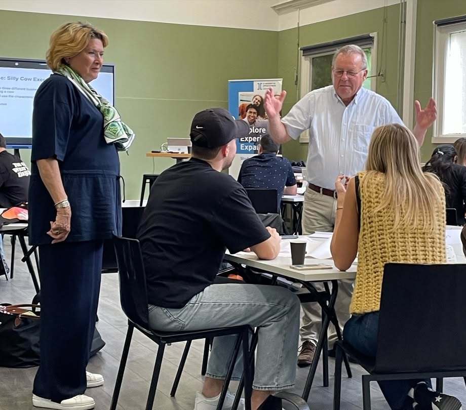 a group of people in a classroom
