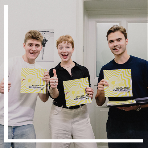 a group of people posing for the camera