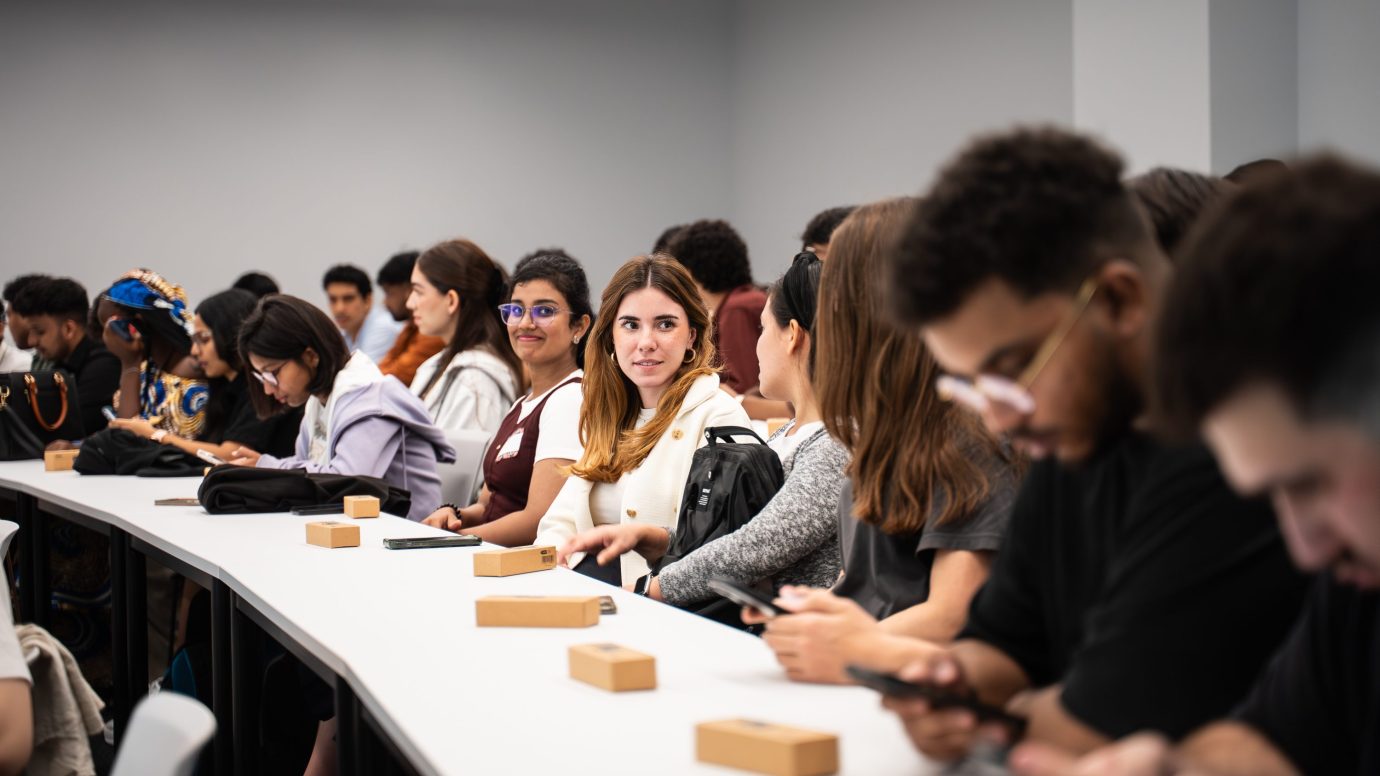 a group of people sitting at a table