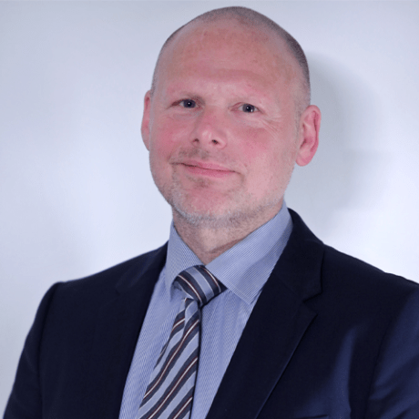 a man in a suit and tie