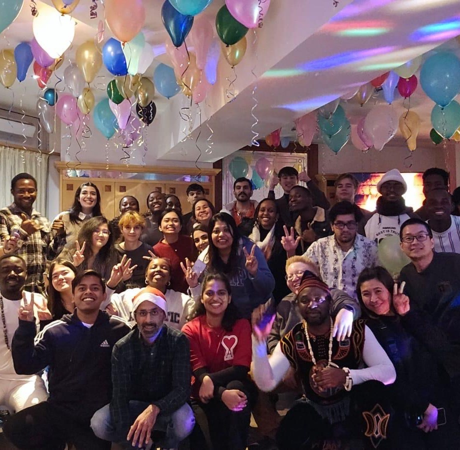 a group of people posing for a photo